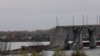 Several spans of the main Kherson bridge across the Dnieper River are completely destroyed.
