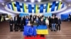 Ukraine's President Volodymyr Zelenskiy (center), Prime Minister Denys Shmyhal (right), and European Commission President Ursula von der Leyen pose for a picture with other officials before the start of a Ukraine-EU summit in Kyiv on February 2.