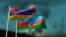 Armenian and Azerbaijani flags flutter in the wind. 