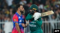 آصف علی بازیکن پاکستانی و فرید ملک بازیکن افغان