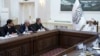 Turkmen Foreign Minister Rashid Meredov (third from left) and his delegation meet with Taliban Prime Minister Mullah Hassan Akhund in Kabul on October 30.