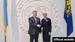 Президент України Петро Порошенко і директор-розпорядник МВФ Крістін Лаґард (архівне фото)