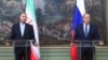 Russia - Russian Foreign Minister Sergei Lavrov (right) and his Iranian counterpart Hossein Amir-Abdollahian hold a joint news conference, Moscow, October 6, 2021.