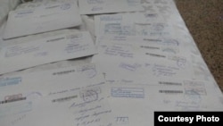 Маркум жоокердин жакындарына бийлик органдарынан келген жооп каттар.