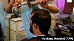 تصویر آرشیف: دکان سلمانی 