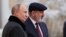 Russia - Russian President Vladimir Putin greets Armenian Prime Minister Nikol Pashinian during a CIS sumit in St. Petersburg, December 26, 2023.