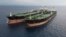 The Iranian tanker Arman (right), which was seized in Indonesian waters in 2023 while transferring oil to a foreign tanker. (file photo)