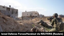 نیرو های اسرائیلی در بخشی از شهر غزه 
