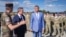 Romanian President Klaus Iohannis and Luxembourg Prime Minister Xavier Bettel visit the NATO base in Cincu, Romania, on September 5.