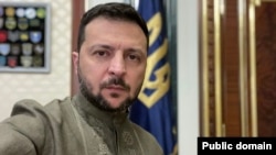 Ukrainian President Volodymyr Zelenskiy wears a traditional vyshyvanka shirt embroidered with motifs that he says 'symbolize the unity of the Ukrainian and Crimean peoples' on May 18. 