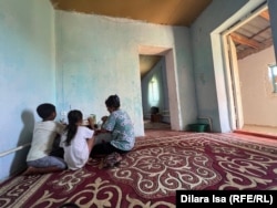 Elmira Kemelova has been raising her children on her own since her husband was imprisoned three years ago.