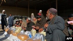 روند توزیع کمک های بشری سازمان ملل برای مردم در افغانستان 