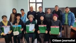 "Ош жаңырыгынын" жамааты.