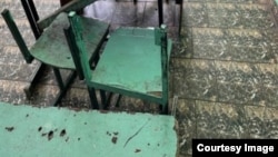 Ашканадагы эмеректер. Аравандагы интернат. Кыйноолорго каршы борбор тараткан сүрөт.