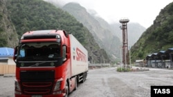 Russia - An Armenia commercial truck passes through the Russian-Georgian border crossing at Upper Lars, June 21, 2023: 