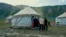Young Kyrgyz mother's yurt camp on Central Asia's highest peak 