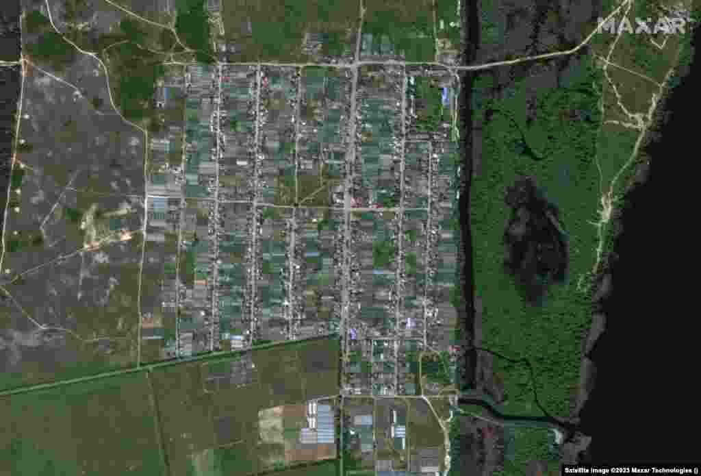 A view of Korsunka from May 15 and following the flooding on June 7.