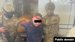 Кармалган шектүү.