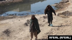 تصویر آرشیف: دو تن از افراد معتاد 