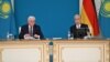 German President Frank-Walter Steinmeier (left) and Kazakh President Qasym-Zhomart Toqaev in Astana on June 20.