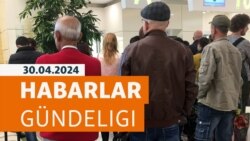 HG: Ýolbaşçylar ýüzünde Berdimuhamedowlaryň suraty bolan goşar sagatlaryny satyn almaga mejbur edilýär