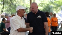 Armenia - Opposition mayoral candidate Andranik Tevanian (right) starts his election campaign in Yerevan, August 23, 2023.