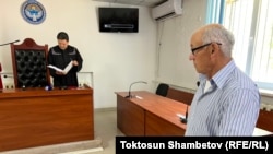 Судья Ильязбек Тажыбаев жана Өндүрүш Токтонасыров. Бишкектин Биринчи май райондук соту. 19-июнь, 2024-жыл.