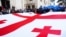 Во время протестов в Грузии, кроме государственных флагов, много флагов и ЕС