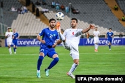 2026-жылы өтө турган дүйнө чемпионатынын тандоо оюндарынын экинчи турунун "Е" группасынын оюндары. Иран - Өзбекстан курамаларынын беттеши. Иран, Тегеран шаары. 11-июнь, 2024-жыл.