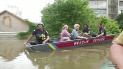 Суу астында калган Херсон, эвакуацияланган эл 