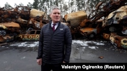 UKRAINE – British Labour Party leader Keir Starmer visits a place where civilian cars destroyed during Russia's attack on Ukraine are collected, in the town of Irpin, outside of Kyiv, February 16, 2023