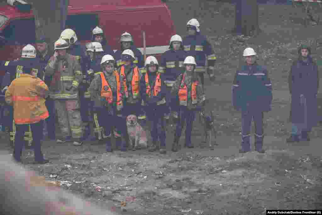 Members of the Antares team gather at the site of a strike. Borysenko says one of the toughest parts of the work comes after the dogs have thoroughly scoured the site of a strike for survivors. &quot;It&#39;s a scary moment when I say, &#39;There&rsquo;s no one left alive in this rubble,&#39;&quot; she said. &quot;That means the heavy equipment gets sent in. It&rsquo;s a big responsibility...what if there is a survivor in there? That person will never return home.&quot; &nbsp;