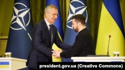 NATO Secretary-General Jens Stoltenberg (left) meets with Ukrainian President Volodymyr Zelenskiy in Kyiv on April 20. 