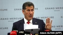 Синан Оган.