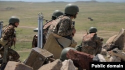 Armenia - Armenian soldiers take part in a military exercise, May 16, 2024.
