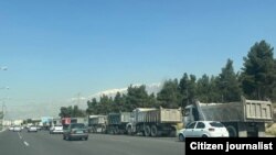 Иран. Оор жүк ташуучулар. Иллюстрациялык сүрөт. 