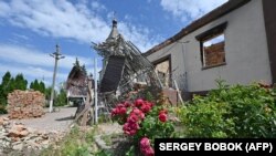 Пошкоджений будинок в селі Руська Лозова Харківської області 20 червня 2023 року