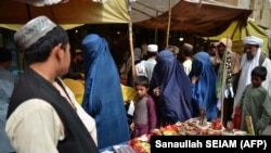 Ооганстандын Кандагар провинциясындагы базарлардын биринде. 23-июль, 2023-жыл. Иллюстрациялык сүрөт. 