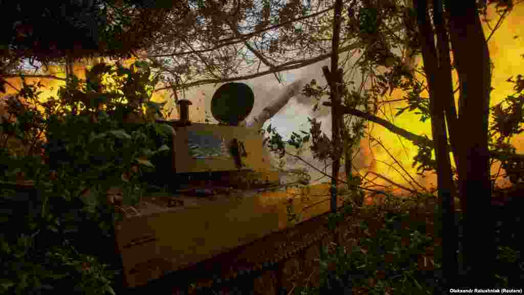 Ukrainian soldiers&nbsp;of the 57th Motorized Infantry Brigade&nbsp;fire a&nbsp;2S1 Gvozdika self-propelled howitzer toward Russian positions near the town of Chasiv Yar in the Donetsk region on June 25.&nbsp;&nbsp; Ukrainian President Volodymyr Zelenskiy was upbeat about his military&#39;s progress during his daily video address late on June 26, calling it a &quot;happy day.&quot;