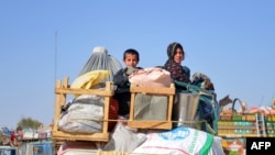 یک خانواده اخراج شده از پاکستان