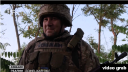 Боєць з позивним «Боцман» на передовій разом з сином