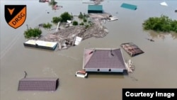 Наводнение после крушения плотины Каховской ГЭС на оккупированных Россией территориях