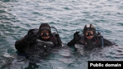 Ысык-Көлдү таштандыдан тазалоо иштерине тартылган суучулдар.