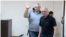Armenia - Former Vanadzor Mayor Mamikon Aslanian (left) greets supporters during his trial in Yerevan, June 15, 2023.