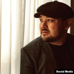 Эржан Осмонов.