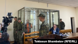 Олжобай Шакир в зале суда. 