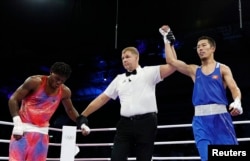 Мунарбек чейрек финалда бокс боюнча дүйнөнүн чемпиону Жамал Харвини 3:2 эсебинде жеңди.