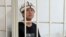 Askat Jetigen attends a court hearing at the Sverdlov court in Bishkek on June 24.
