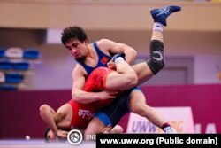 Тайырбек жарым финалда ирандык Ясин Аббасты (кызыл кийимчен) 11:2 эсебинде утуп алды. Астана шаары, 14-апрель, 2023-жыл.