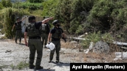 Ливандын чек арасына жакын жерде жүргөн израилдик аскерлер тобу. 